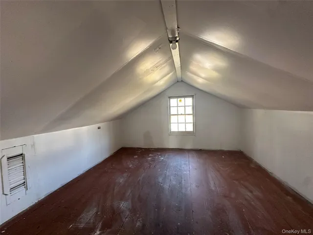 a view of living room with furniture and floor to ceiling window