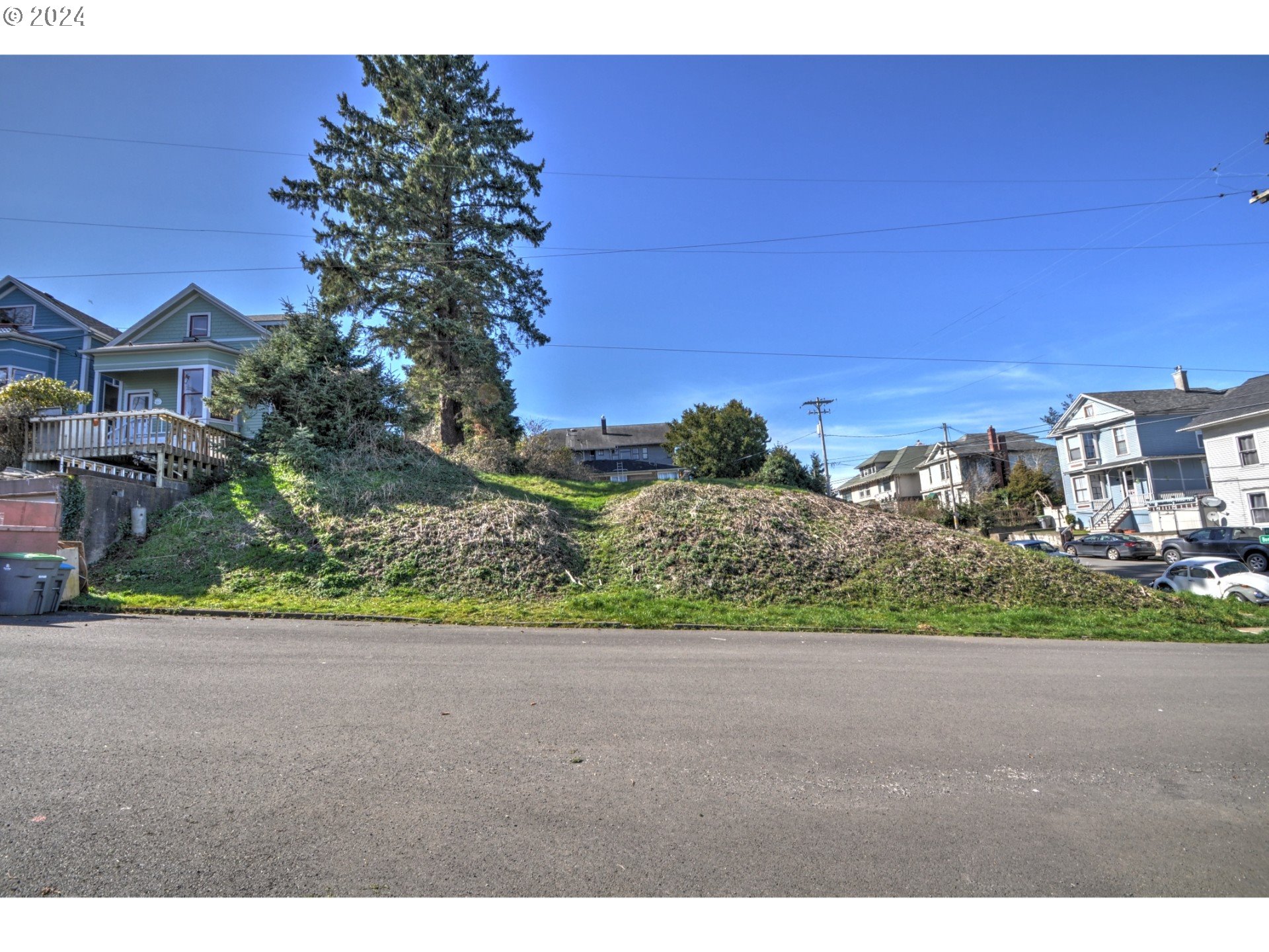 4th Street Astoria, OR 97103 - Photo 12 of 16 a view of a street with a houses
