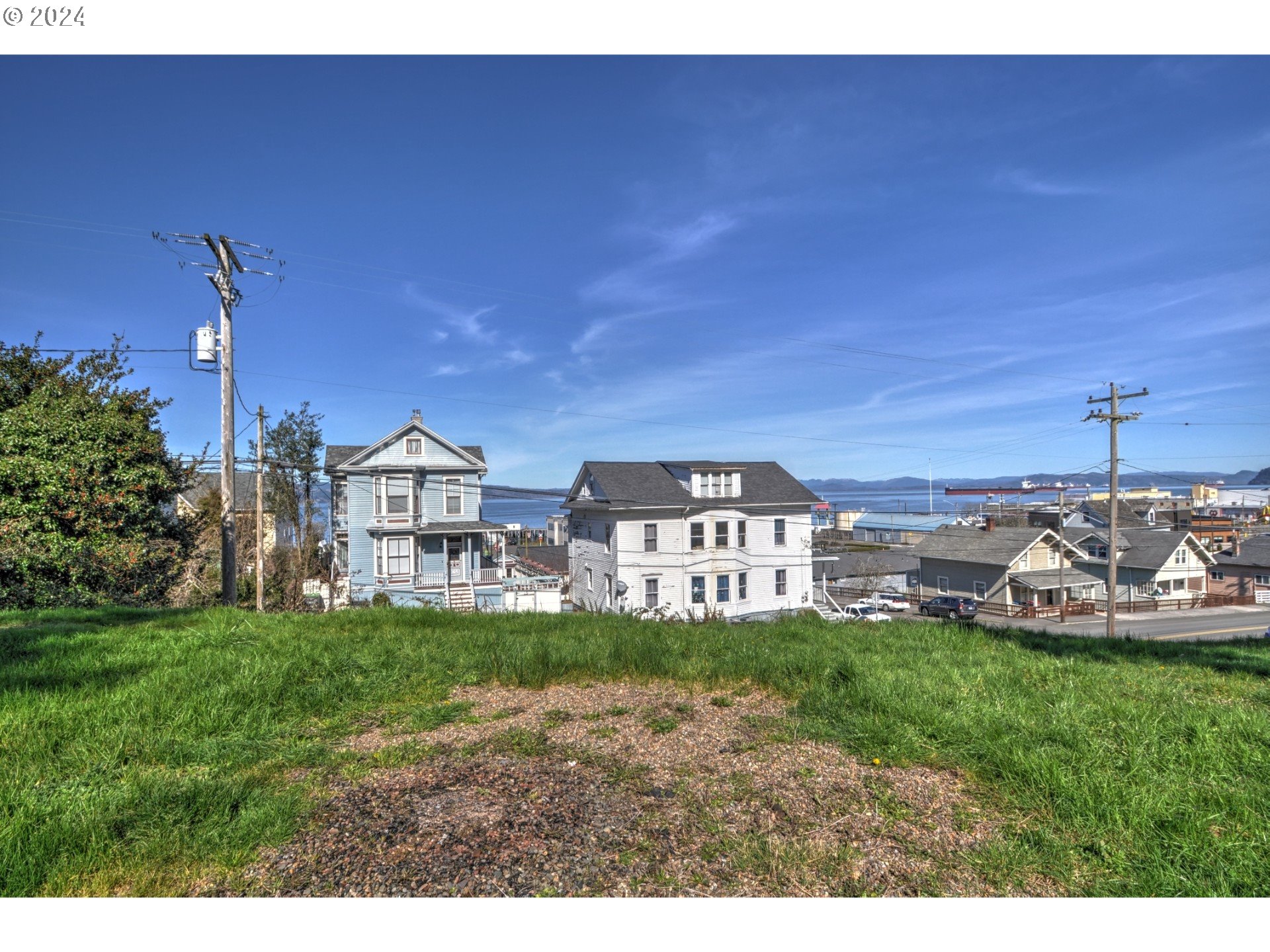 4th Street Astoria, OR 97103 - Photo 13 of 16 a view of a house with a yard and a garden