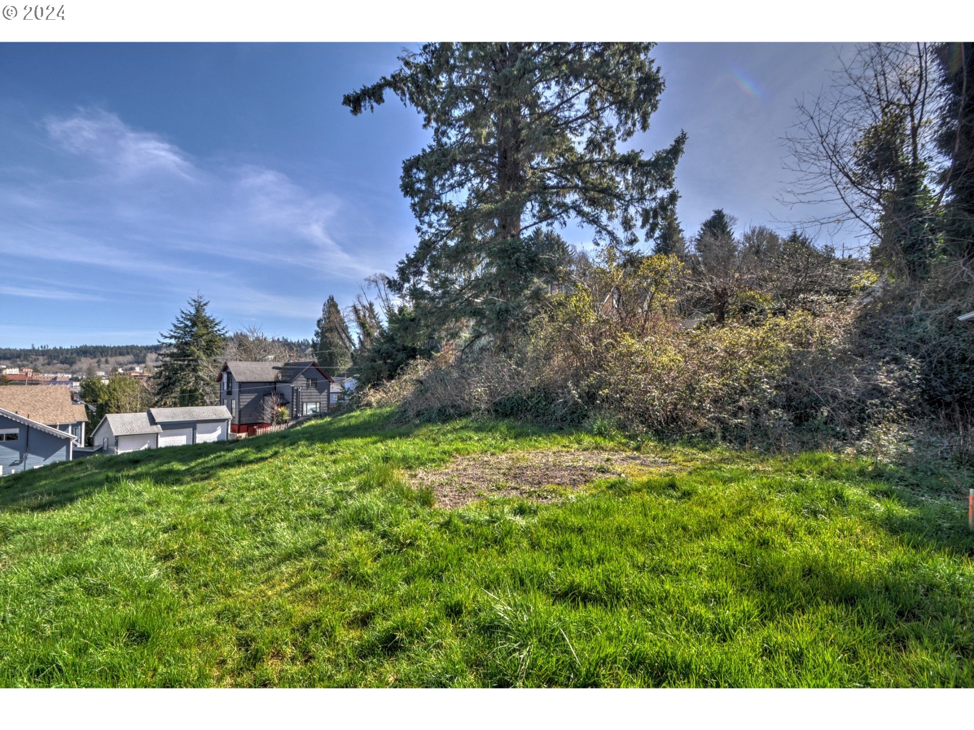 4th Street Astoria, OR 97103 - Photo 16 of 16 a backyard of a house with lots of green space