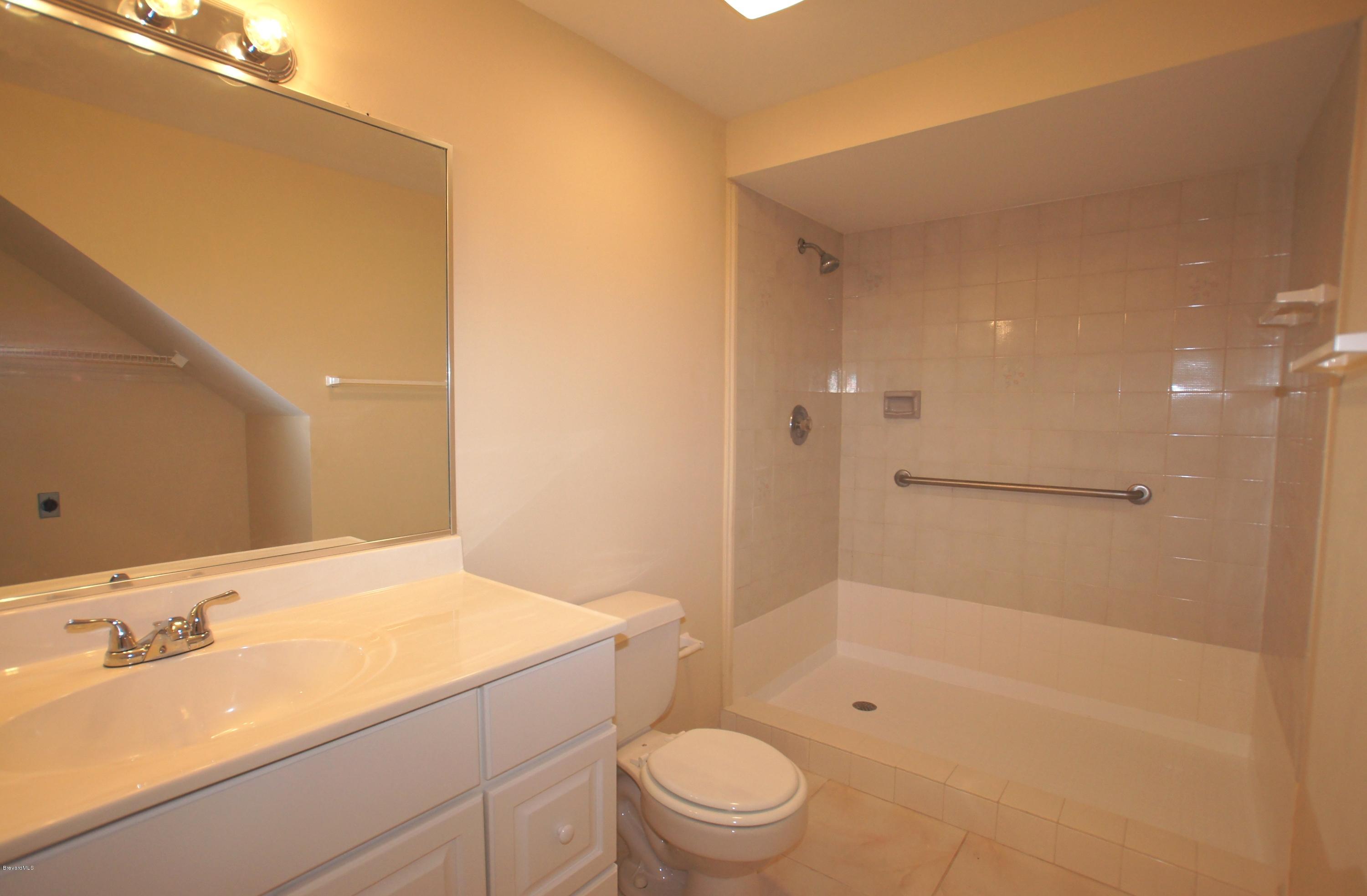 6337 Hudson Road Cocoa, FL 32927 - Photo 16 of 18 Upstairs Bathroom