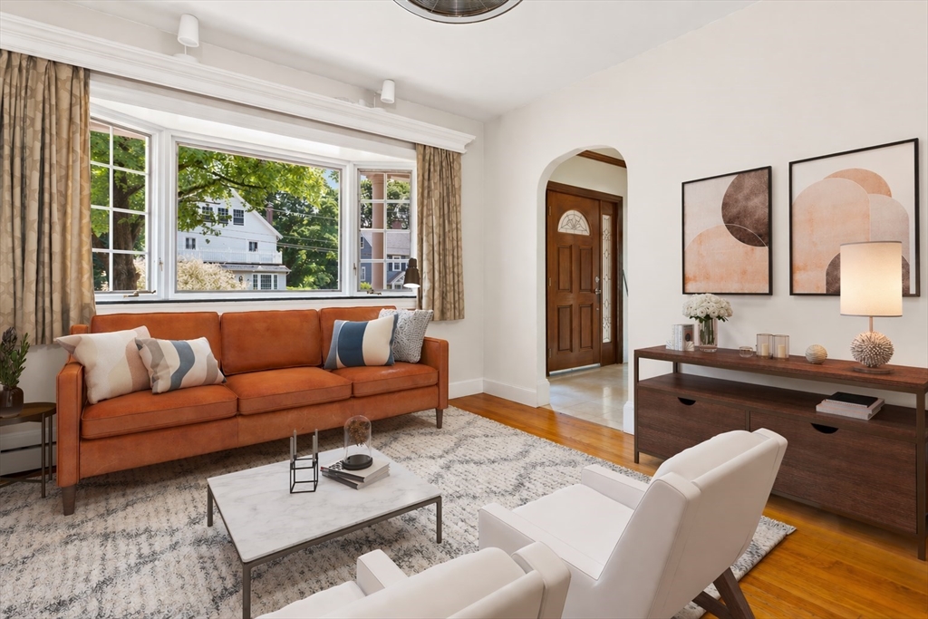 29 Boulevard Road Dedham, MA 02026 - Photo 11 of 34 a living room with furniture and a large window