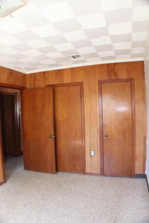 an empty room with an entryway