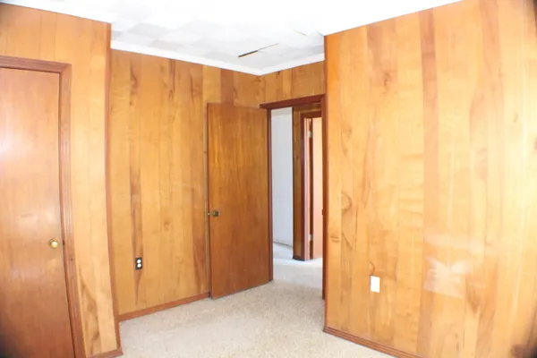 a view of a bathroom with shower and a window