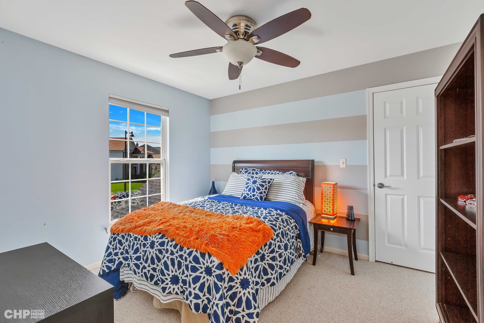 917 Blue Ridge Drive Streamwood, IL 60107 - Photo 22 of 46 a bedroom with a bed and a window