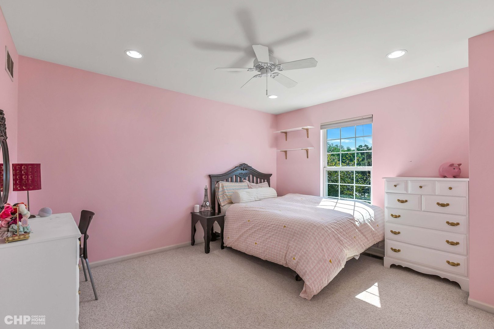 917 Blue Ridge Drive Streamwood, IL 60107 - Photo 25 of 46 a bedroom with a bed and a window