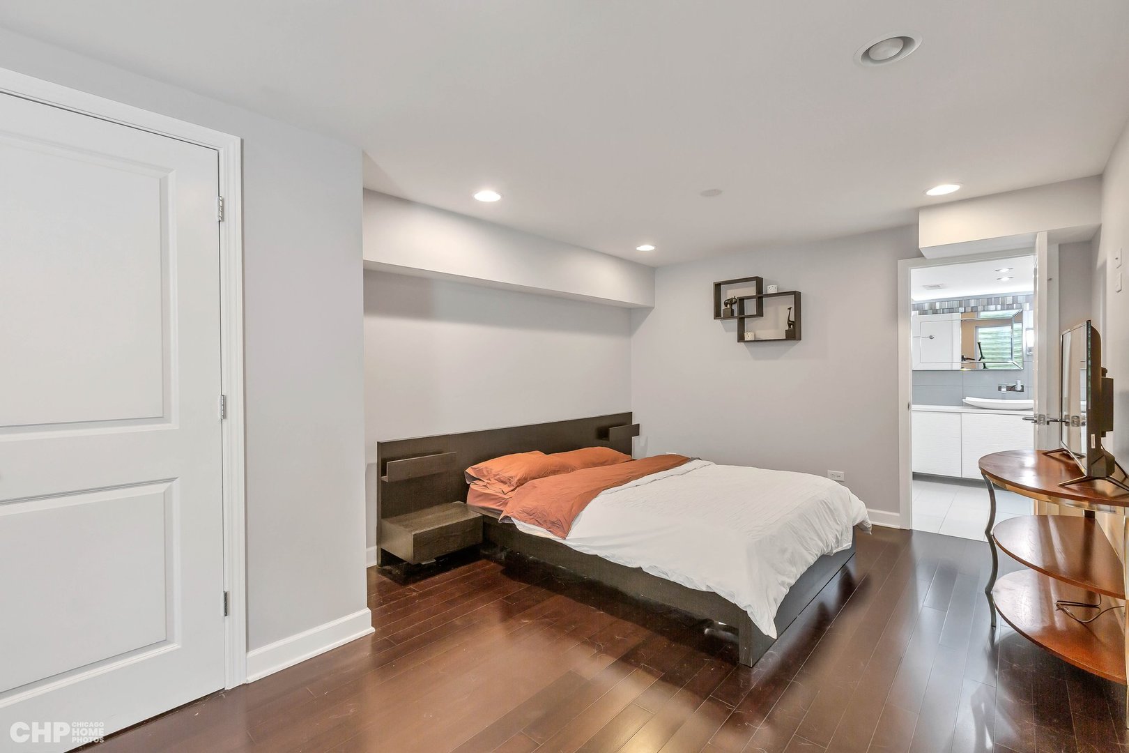 917 Blue Ridge Drive Streamwood, IL 60107 - Photo 33 of 46 a bed sitting in a spacious bedroom next to a window