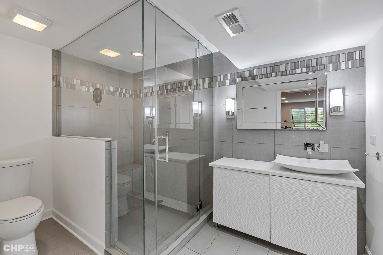 917 Blue Ridge Drive Streamwood, IL 60107 - Photo 36 of 46 a bathroom with a sink a toilet and shower