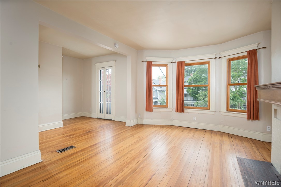 75 Inwood Place Buffalo, NY 14209 - Photo 14 of 36 upper unit living room (prior to tenant move in 12