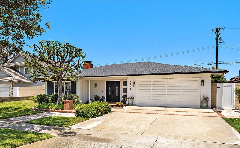 8741 La Roca Avenue Fountain Valley, CA 92708 - Photo 44 of 50 Wide brick-accented driveway