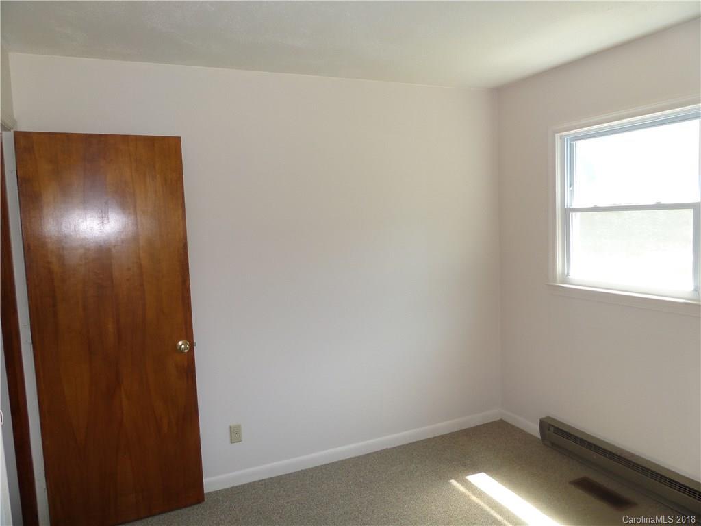 145 Evergreen Road, Unit 18 Lancaster, SC 29720 - Photo 22 of 36 an empty room with a window