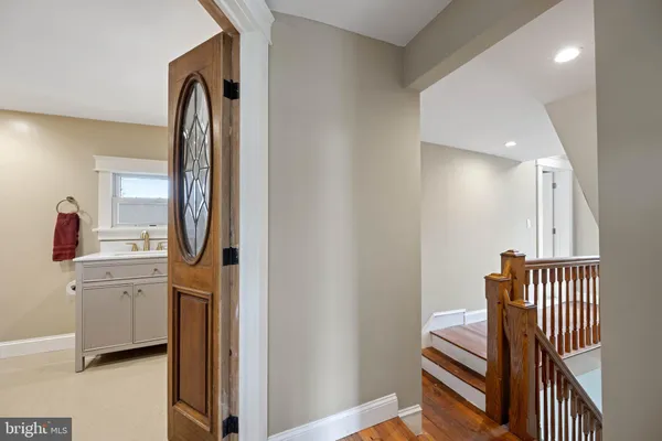 a view of entryway with wooden floor