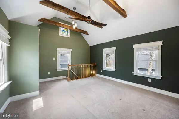 a view of a livingroom with a staircase