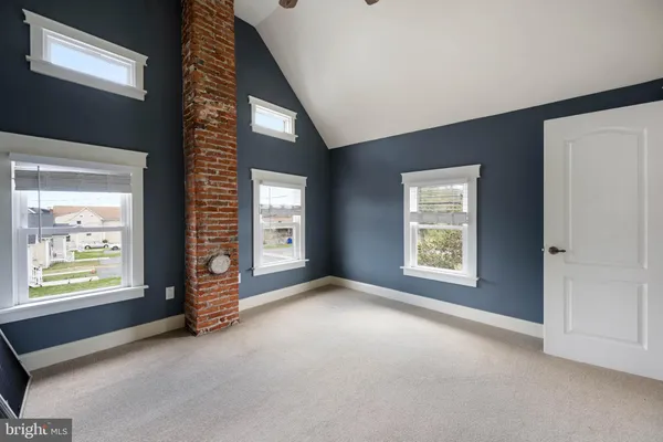 an empty room with windows