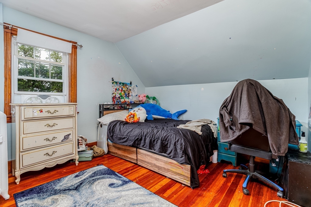 54 Charles Street Gardner, MA 01440 - Photo 24 of 40 a bedroom with a bed and a window
