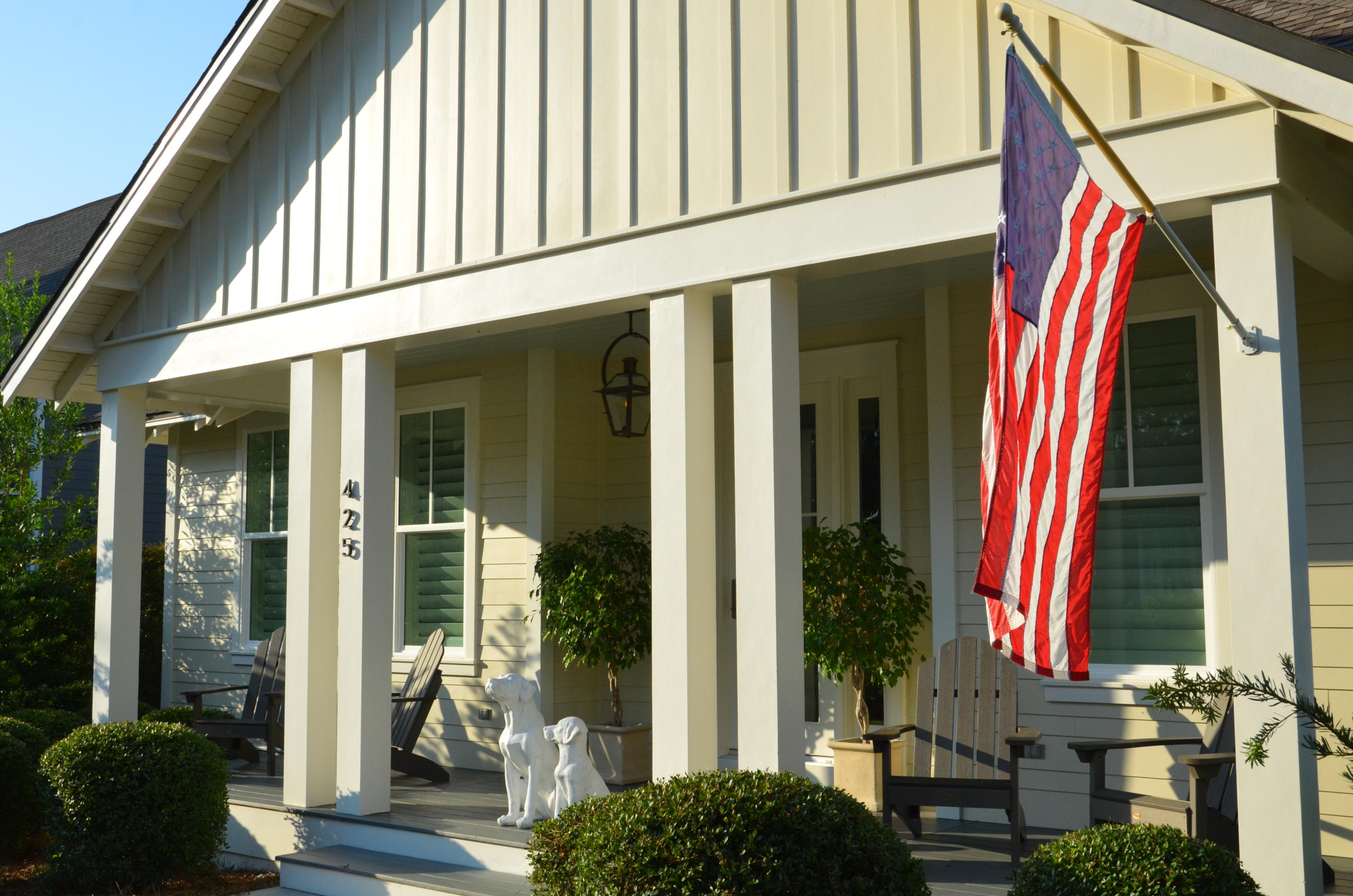 425 Medley Street Watersound, FL 32461 - Photo 1 of 29 a front view of a house with a yard