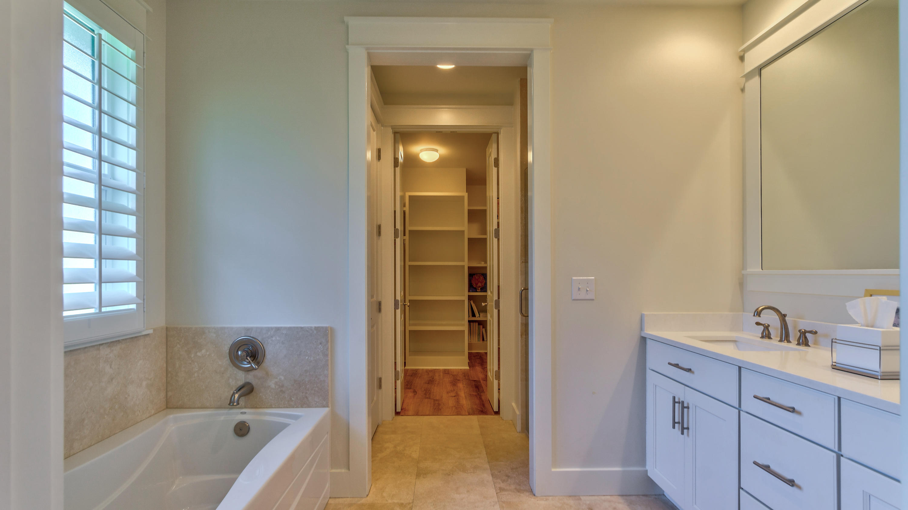 425 Medley Street Watersound, FL 32461 - Photo 11 of 29 a bathroom with a tub shower and sink
