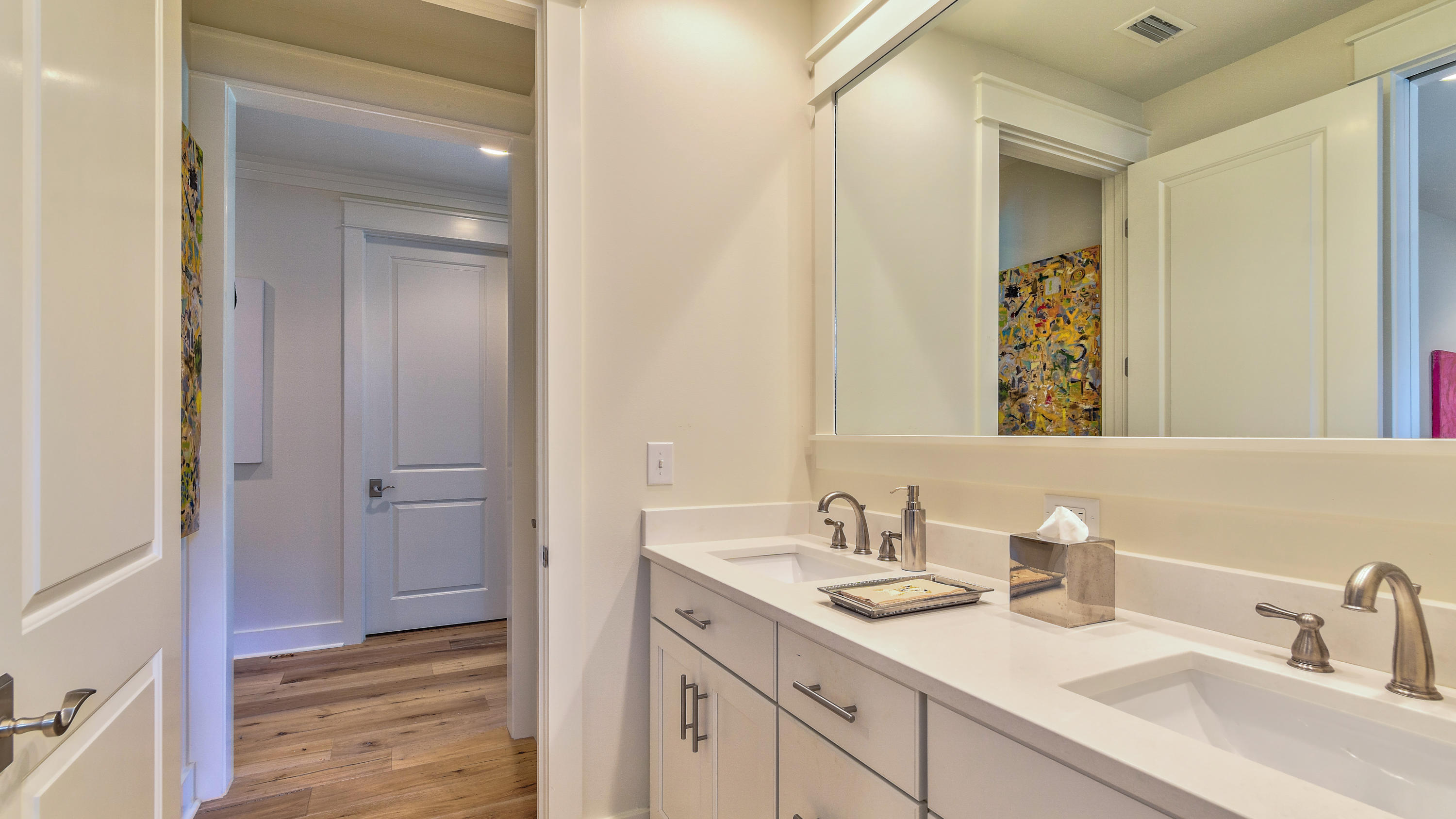 425 Medley Street Watersound, FL 32461 - Photo 15 of 29 a bathroom with a sink and a mirror