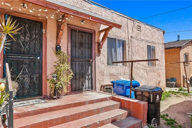 a patio with table and chairs