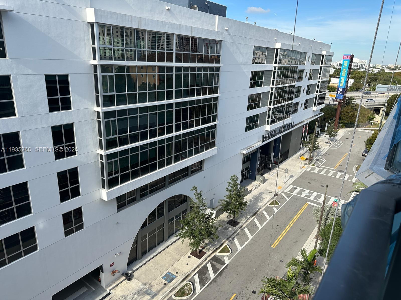 201 Southwest 17th Road, Unit 803 Miami, FL 33129 - Photo 21 of 22 a view of a city with tall buildings