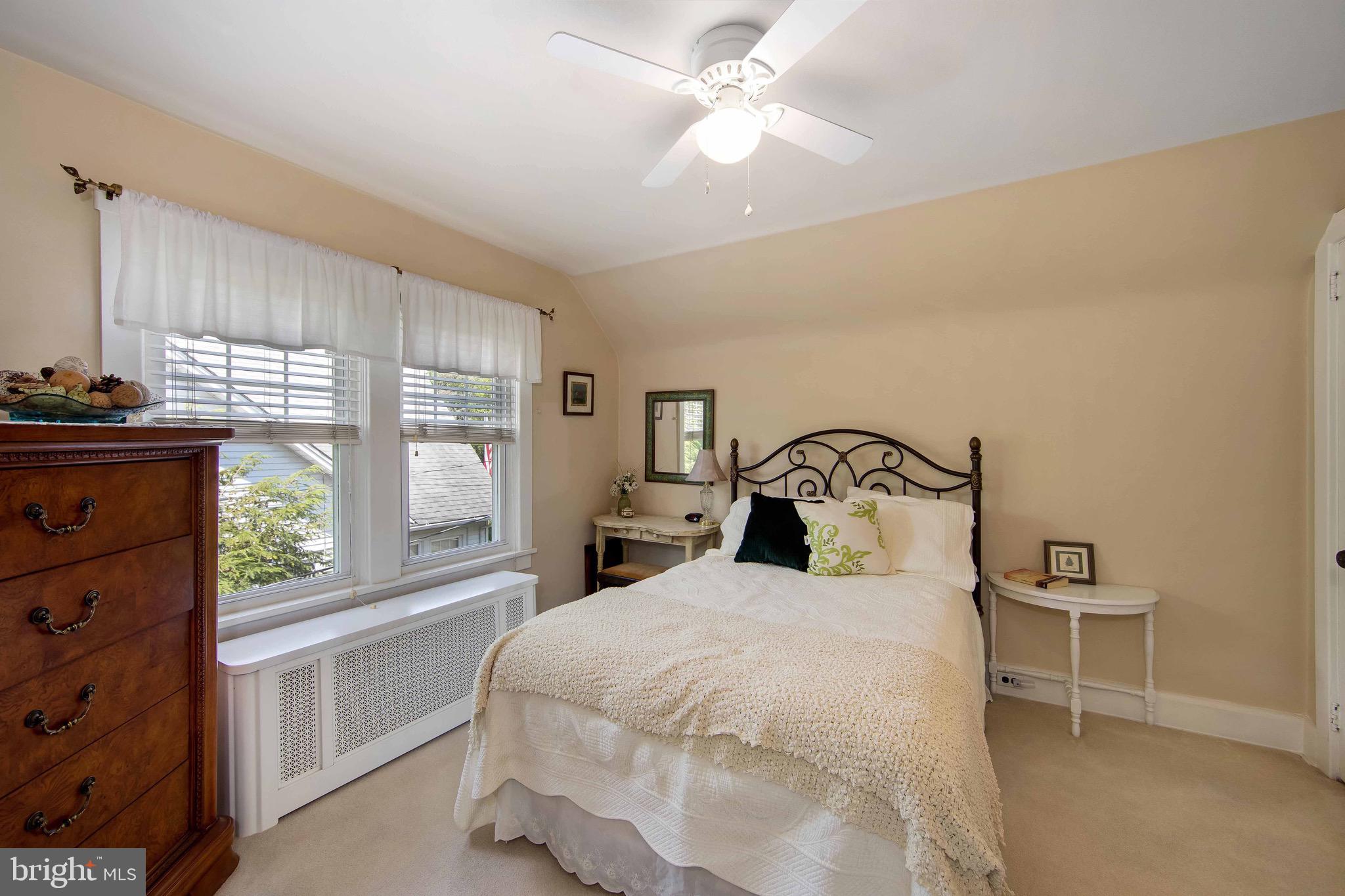 106 4 Mile Road Pemberton, NJ 08068 - Photo 23 of 42 a bedroom with a large bed and a window