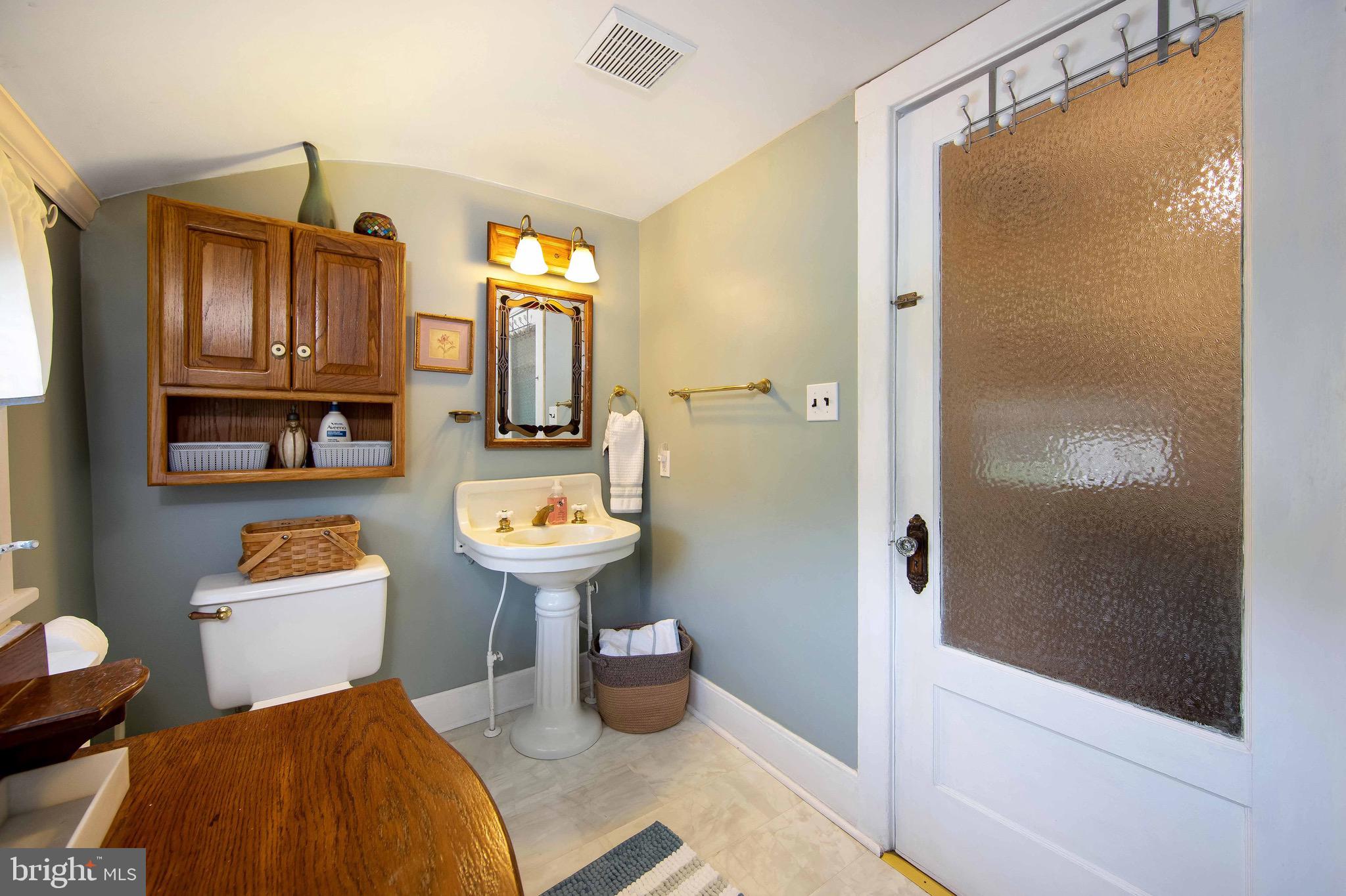 106 4 Mile Road Pemberton, NJ 08068 - Photo 27 of 42 a bathroom with a sink toilet and shower