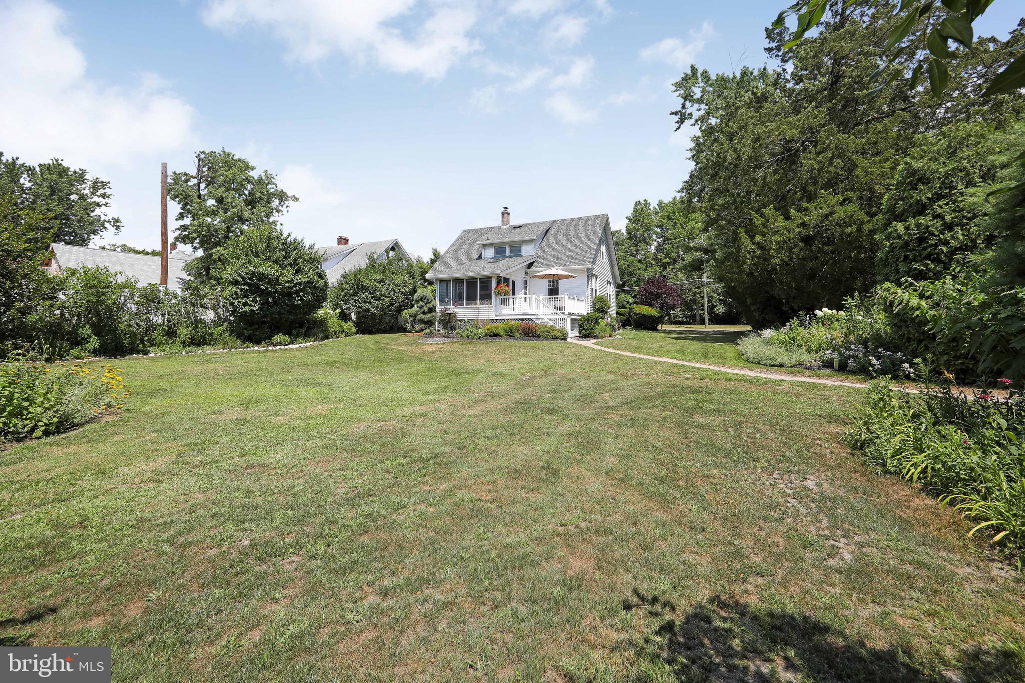 106 4 Mile Road Pemberton, NJ 08068 - Photo 31 of 42 a front view of a house with a yard