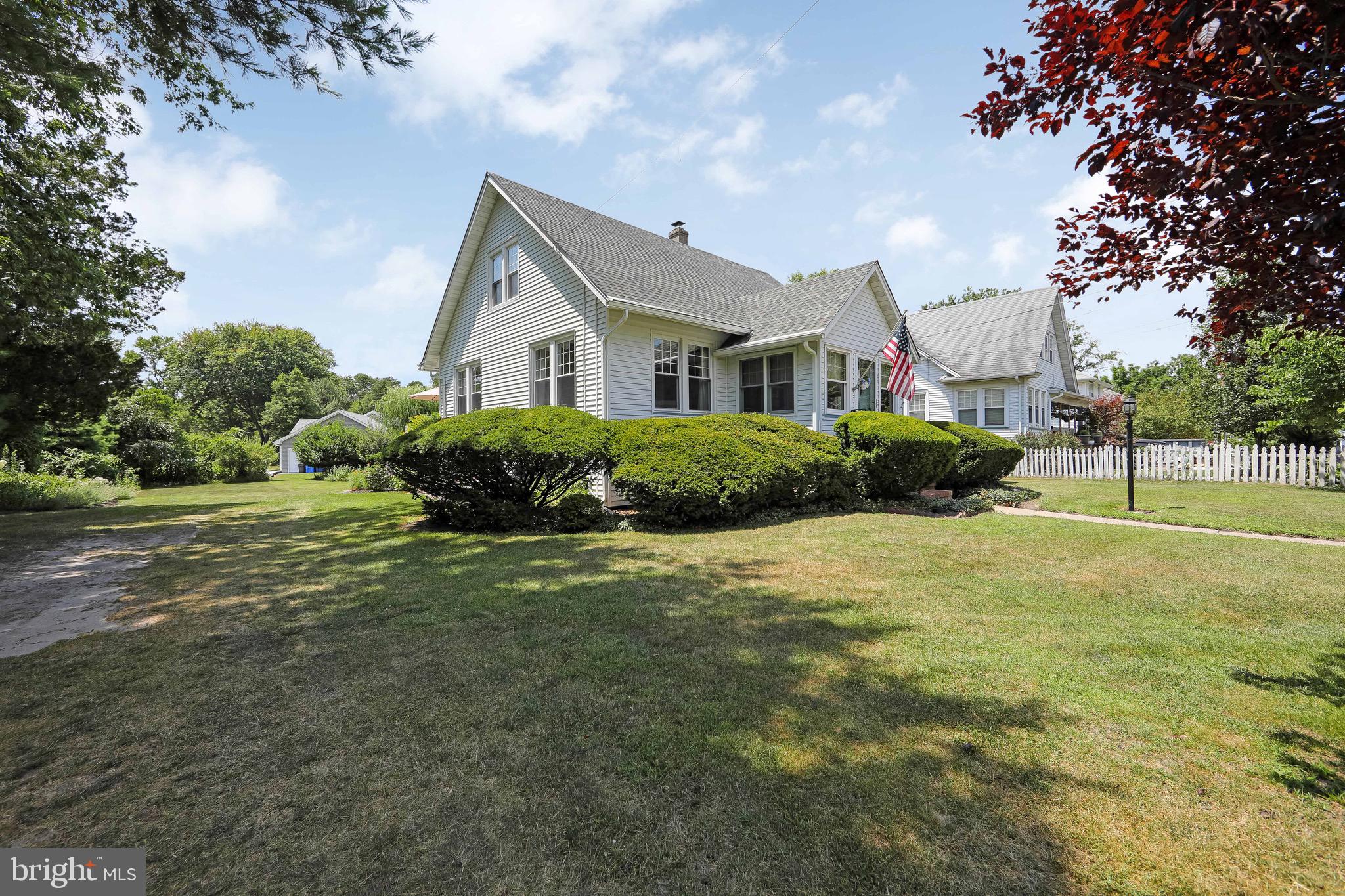 106 4 Mile Road Pemberton, NJ 08068 - Photo 40 of 42 a front view of a house with garden