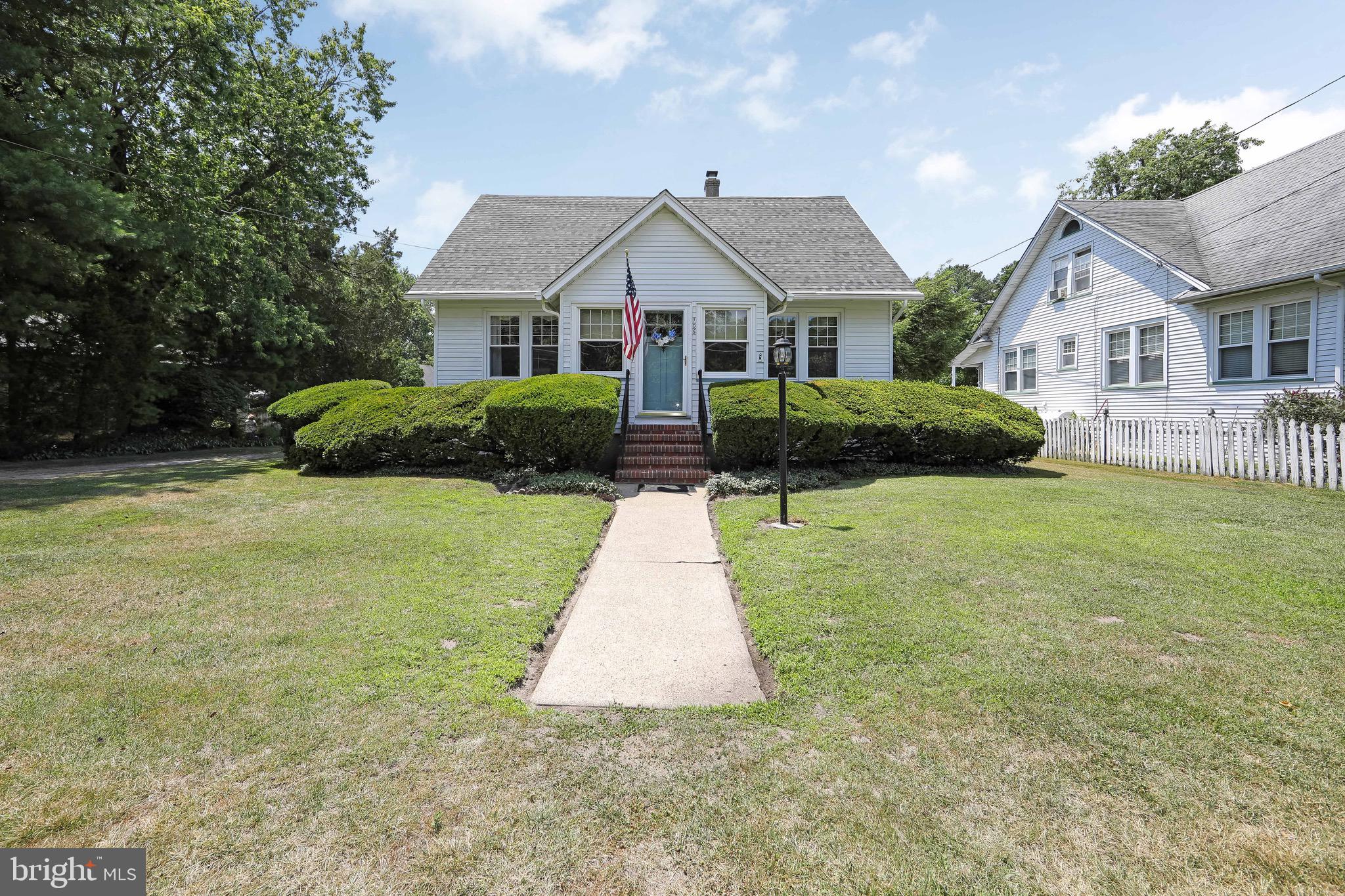 106 4 Mile Road Pemberton, NJ 08068 - Photo 42 of 42 a front view of house with yard and garage