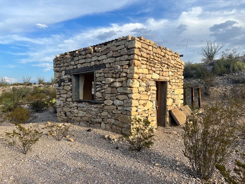 0 Patchouli Gulch Road Terlingua, TX 79852 - Photo 19 of 20 a large building with a yard
