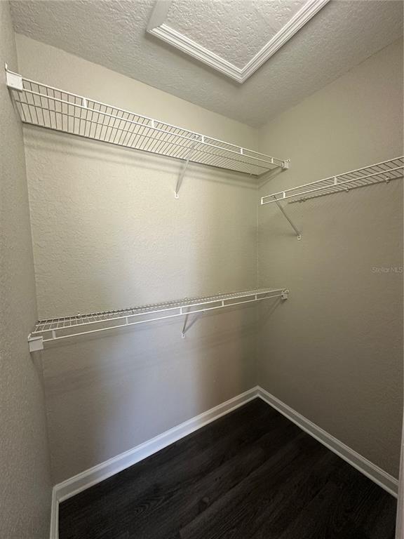 17236 3rd Street Montverde, FL 34756 - Photo 12 of 29 a view of a room with racks on the wall