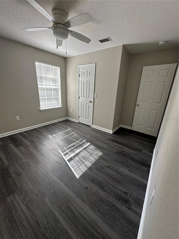 17236 3rd Street Montverde, FL 34756 - Photo 15 of 29 a view of an empty room with wooden floor and a window