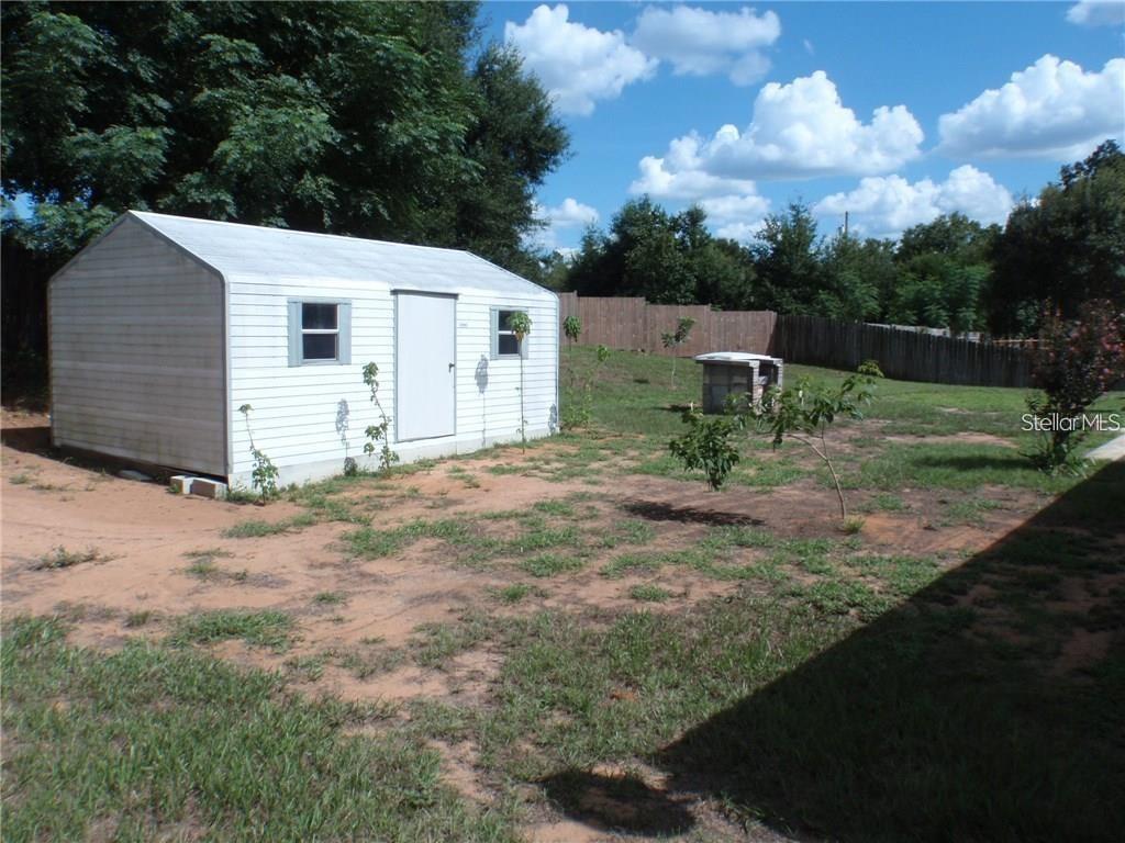 17236 3rd Street Montverde, FL 34756 - Photo 24 of 29 a view of a backyard