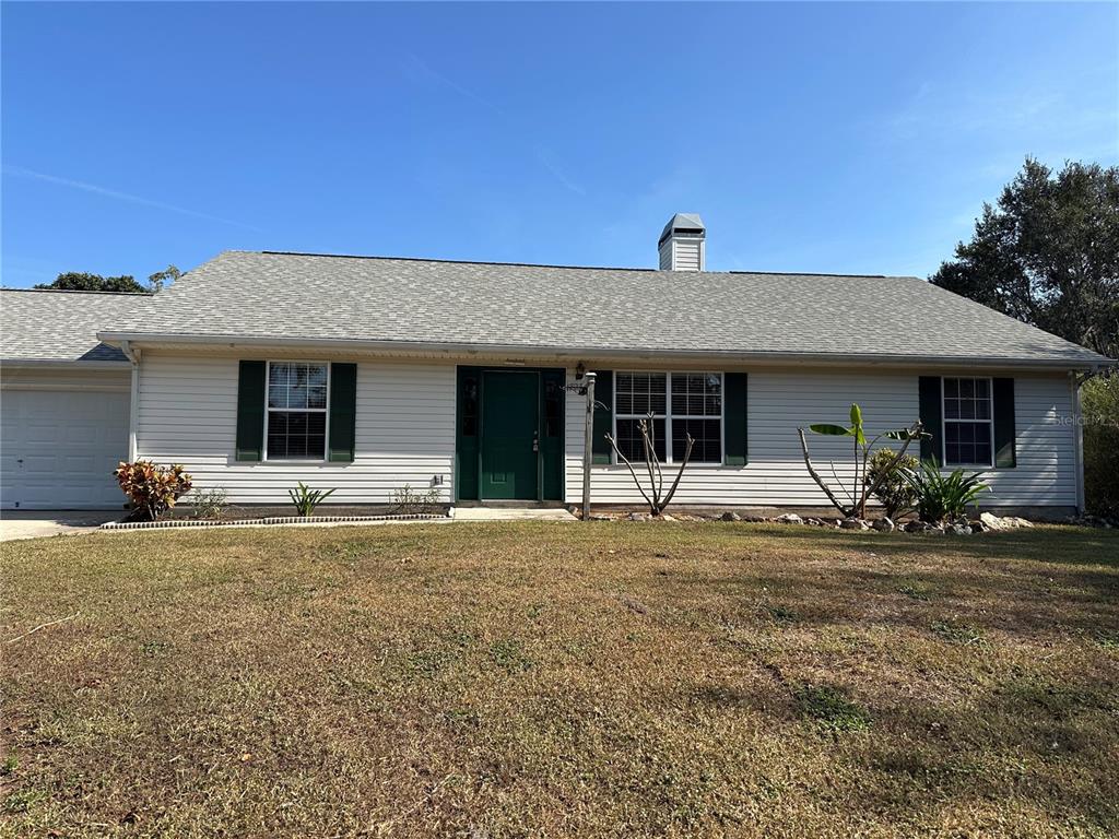 17236 3rd Street Montverde, FL 34756 - Photo 26 of 29 a front view of a house with a yard