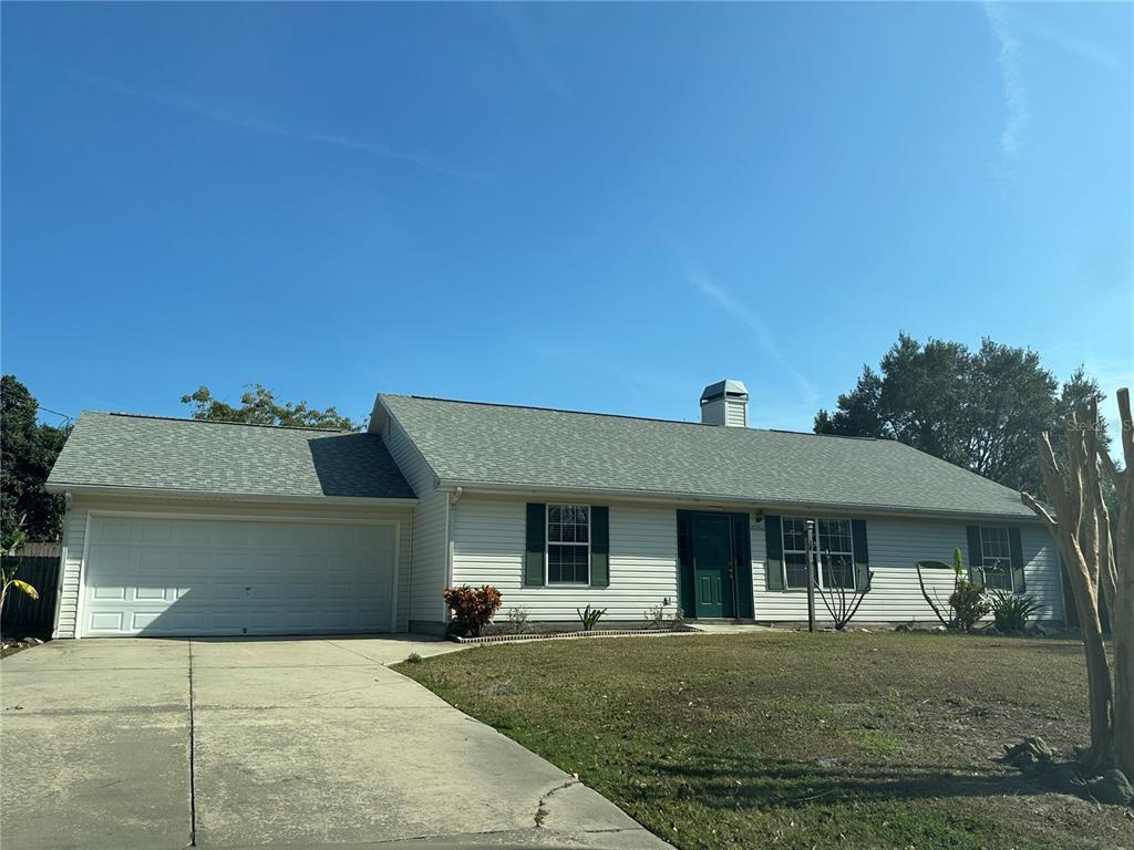 17236 3rd Street Montverde, FL 34756 - Photo 29 of 29 a front view of a house with a yard