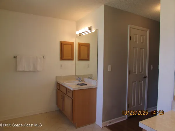 a view of a bathroom with a glass door