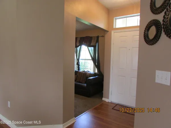 a view of livingroom with furniture and wooden floor