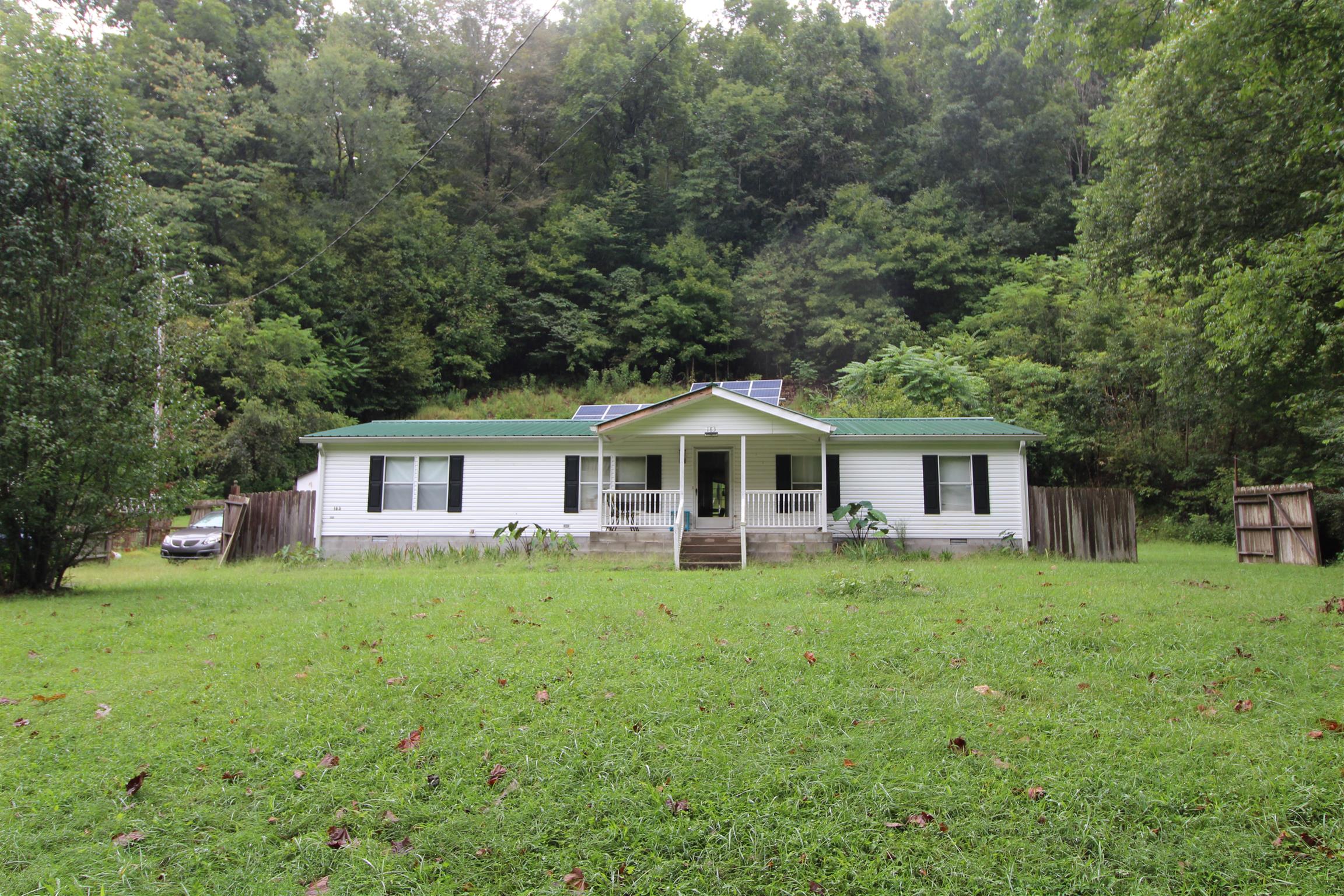 183 Henry Road Goodlettsville, TN 37072 - Photo 1 of 12 a house that is sitting in the forest
