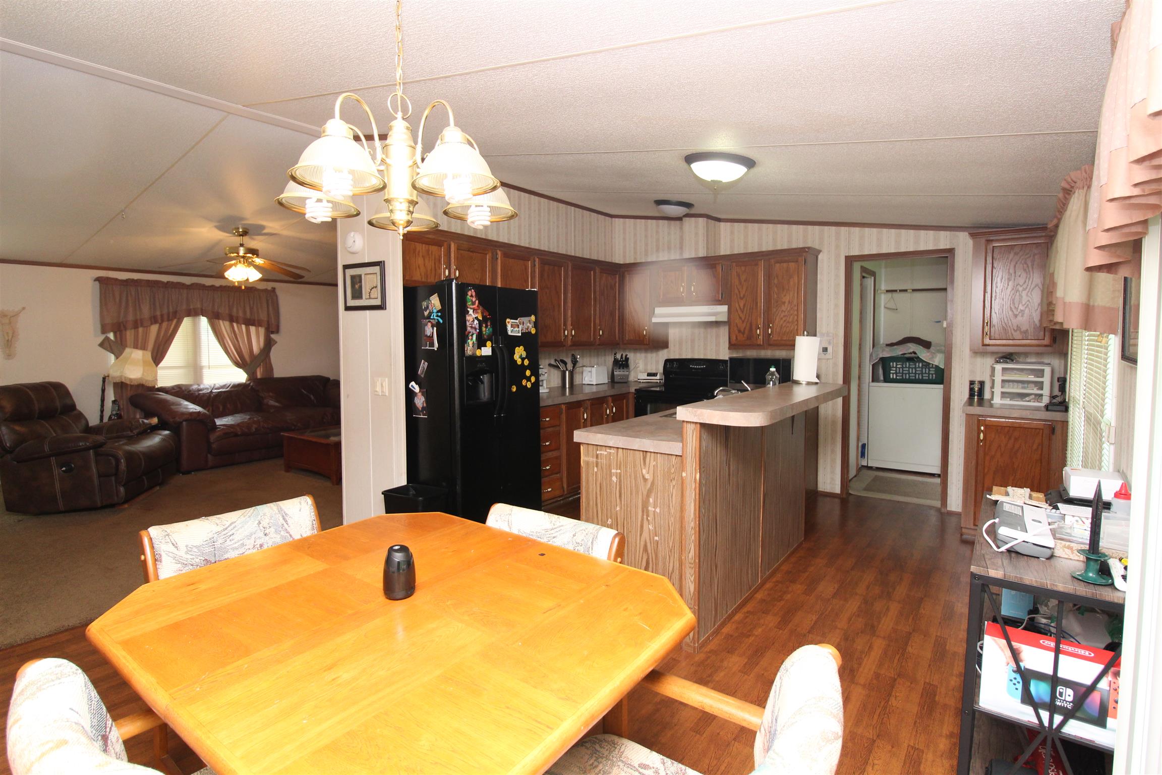 183 Henry Road Goodlettsville, TN 37072 - Photo 8 of 12 a kitchen with refrigerator and window