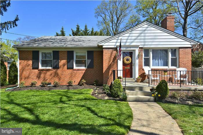 1003 Strout Street Silver Spring, MD 20901 - Photo 1 of 28 front view of a house with a yard