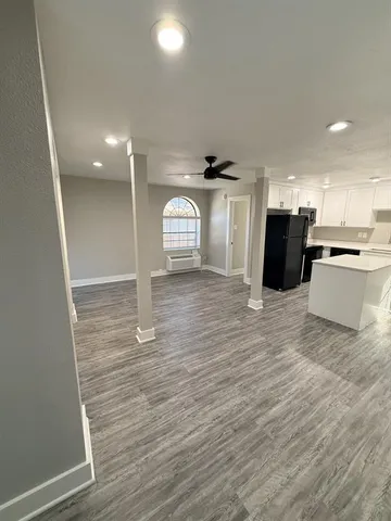 a view of a kitchen with a sink
