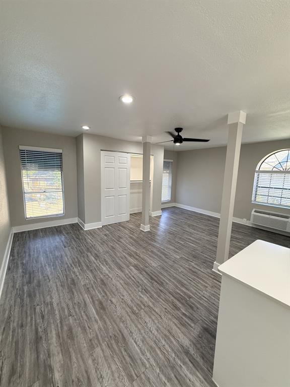 1000 West Spring Valley Road Richardson, TX 75080 - Photo 7 of 7 wooden floor in an empty room with a window