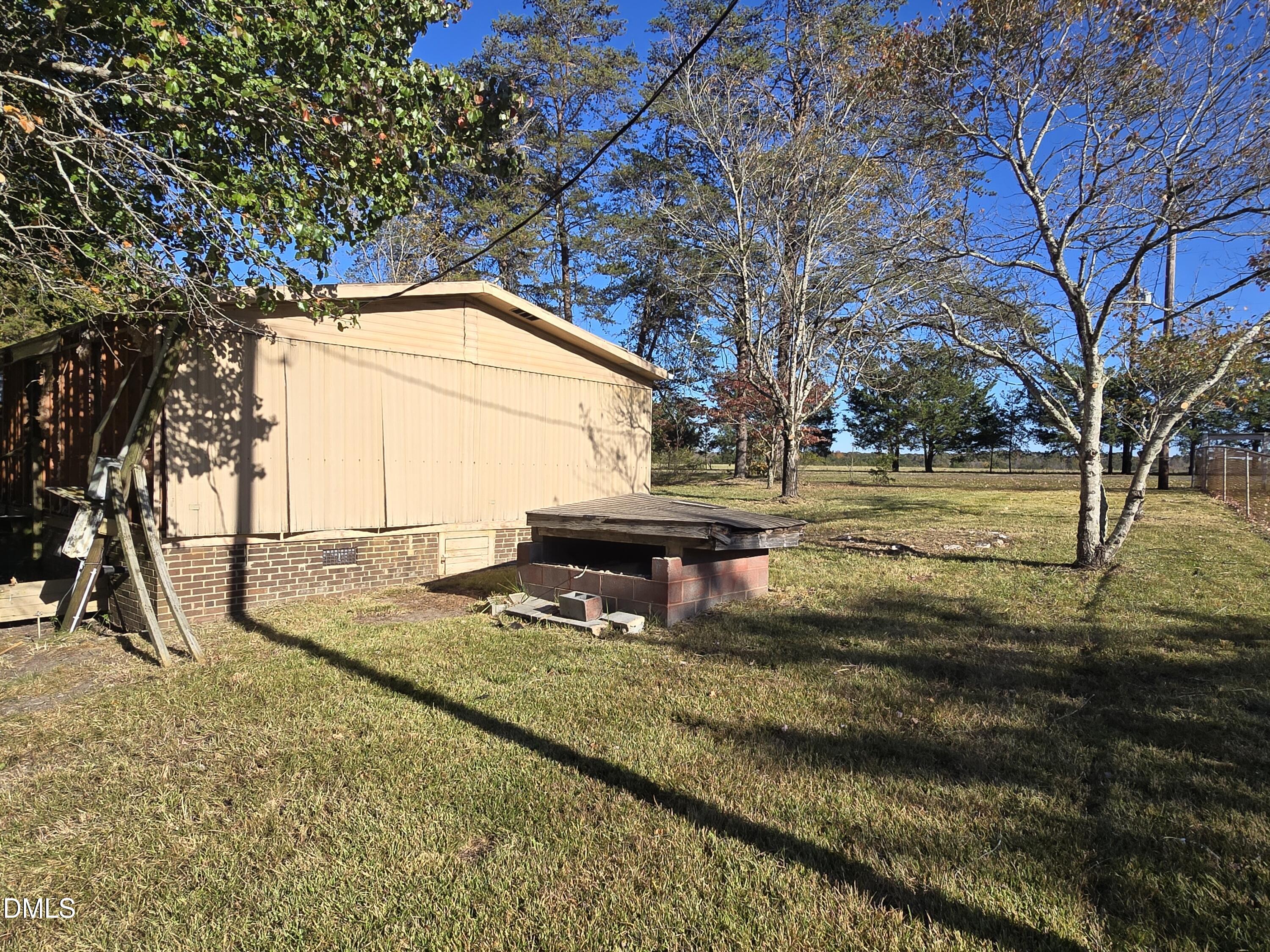 1862 Miles Chapel Road Mebane, NC 27302 - Photo 11 of 20 a view of a yard with an empty space