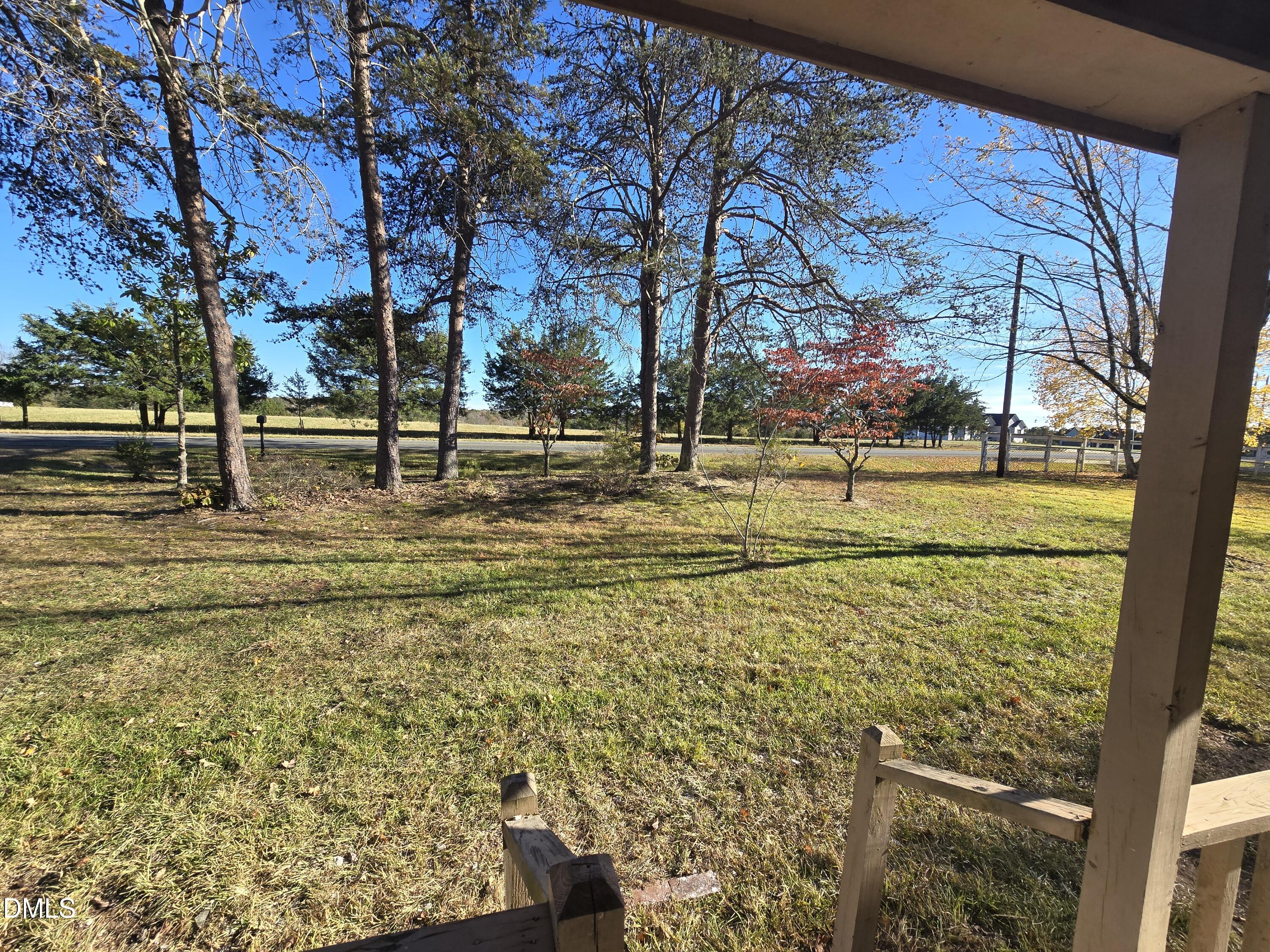 1862 Miles Chapel Road Mebane, NC 27302 - Photo 16 of 20 a view of a yard with tree s