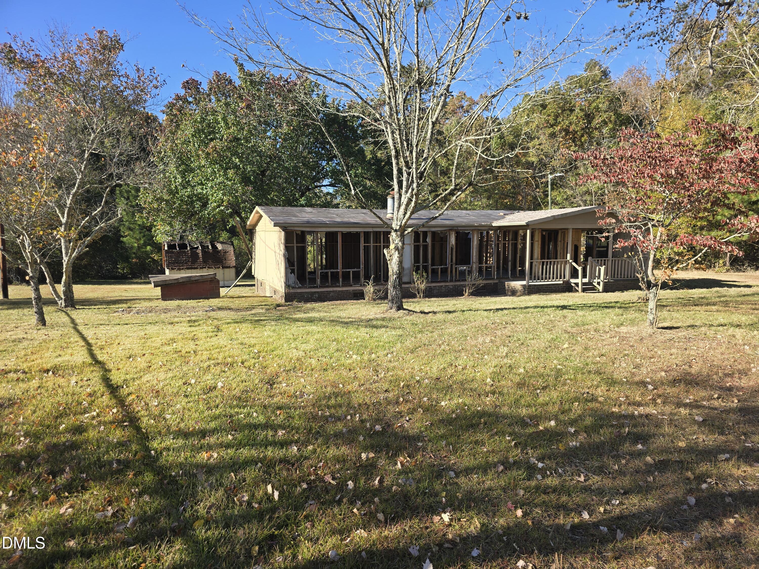 1862 Miles Chapel Road Mebane, NC 27302 - Photo 2 of 20 a front view of a house with swimming pool