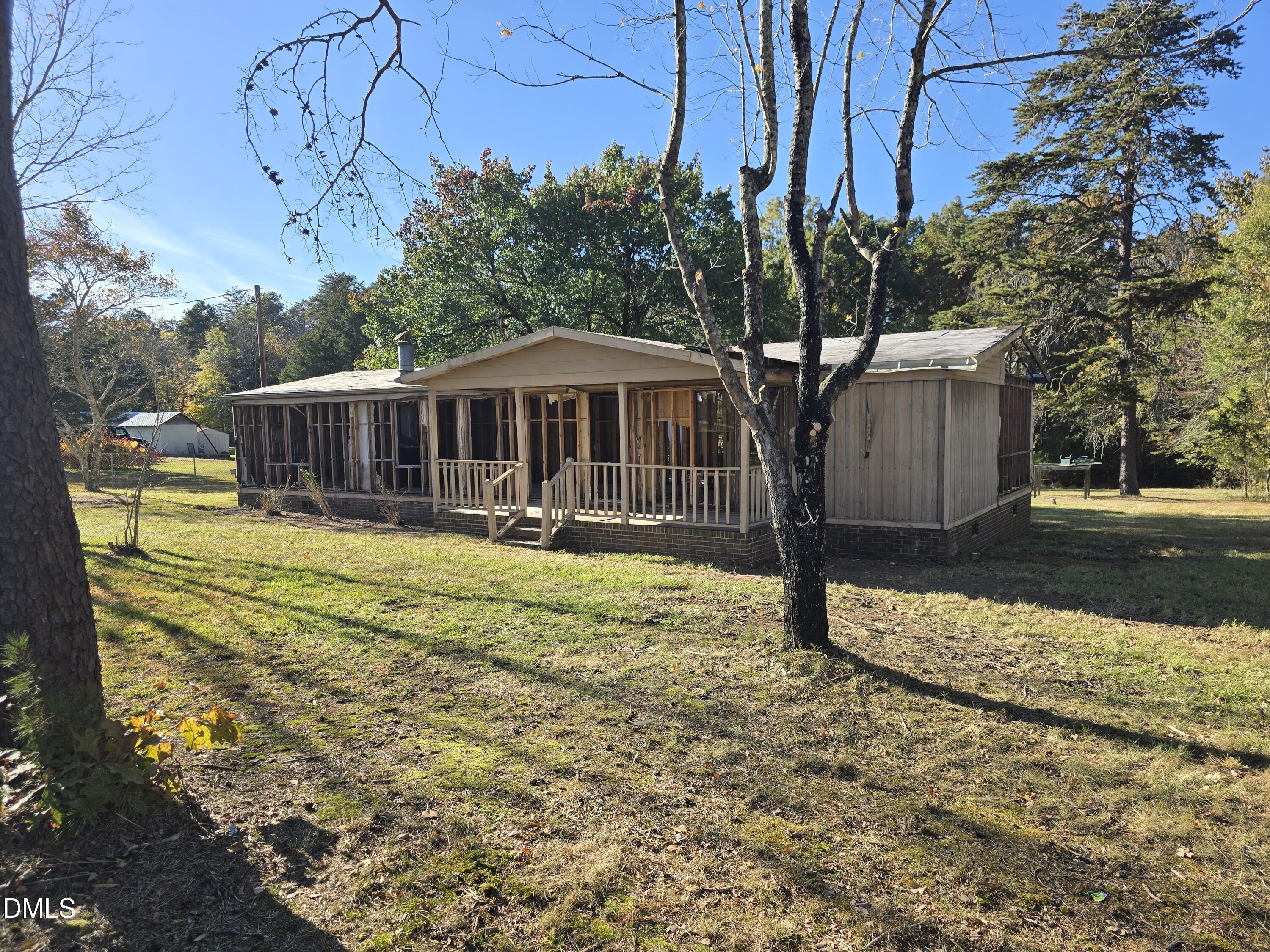 1862 Miles Chapel Road Mebane, NC 27302 - Photo 4 of 20 a front view of a house with a yard