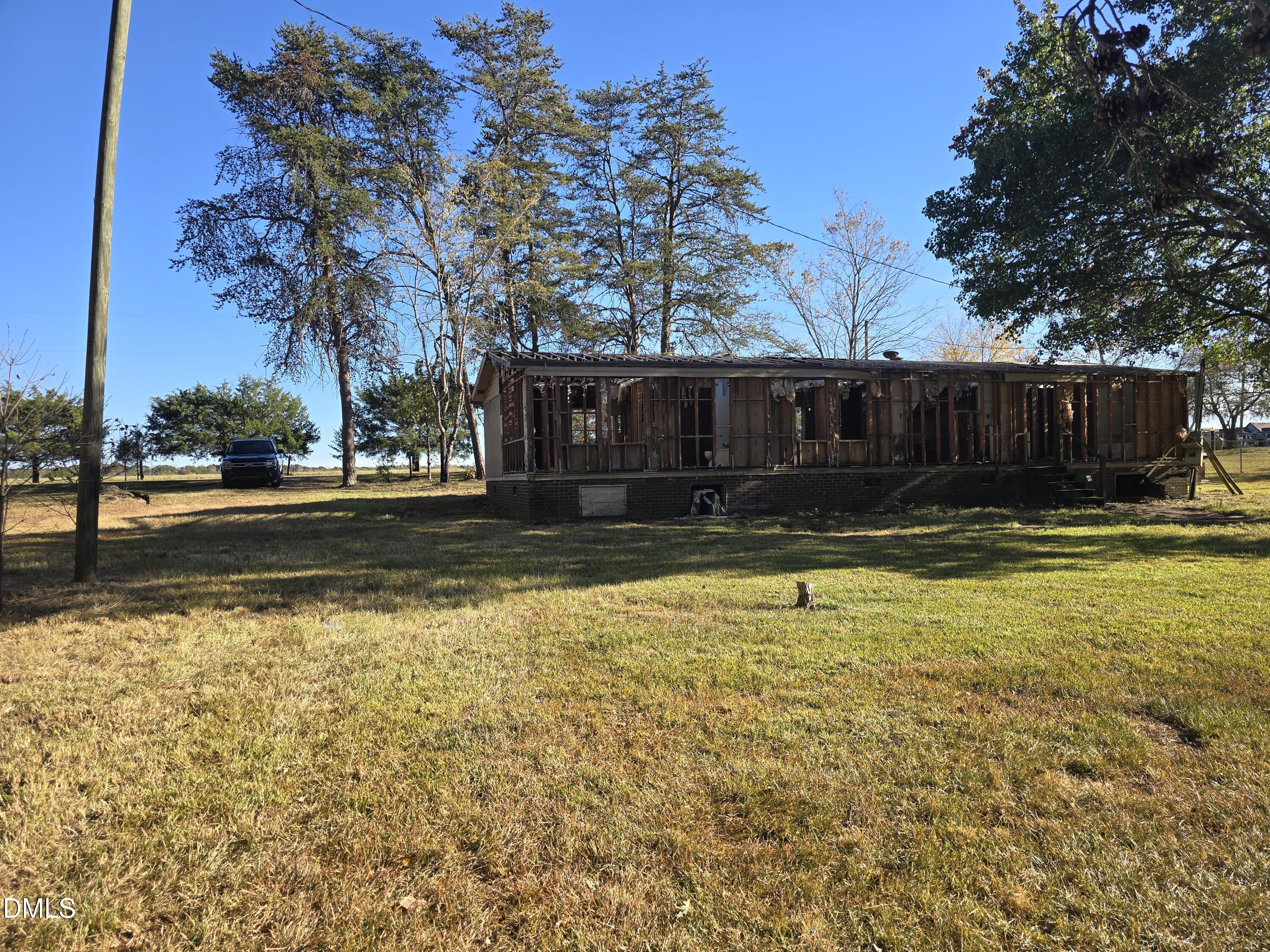 1862 Miles Chapel Road Mebane, NC 27302 - Photo 6 of 20 a view of swimming pool with outdoor seating and yard in the back