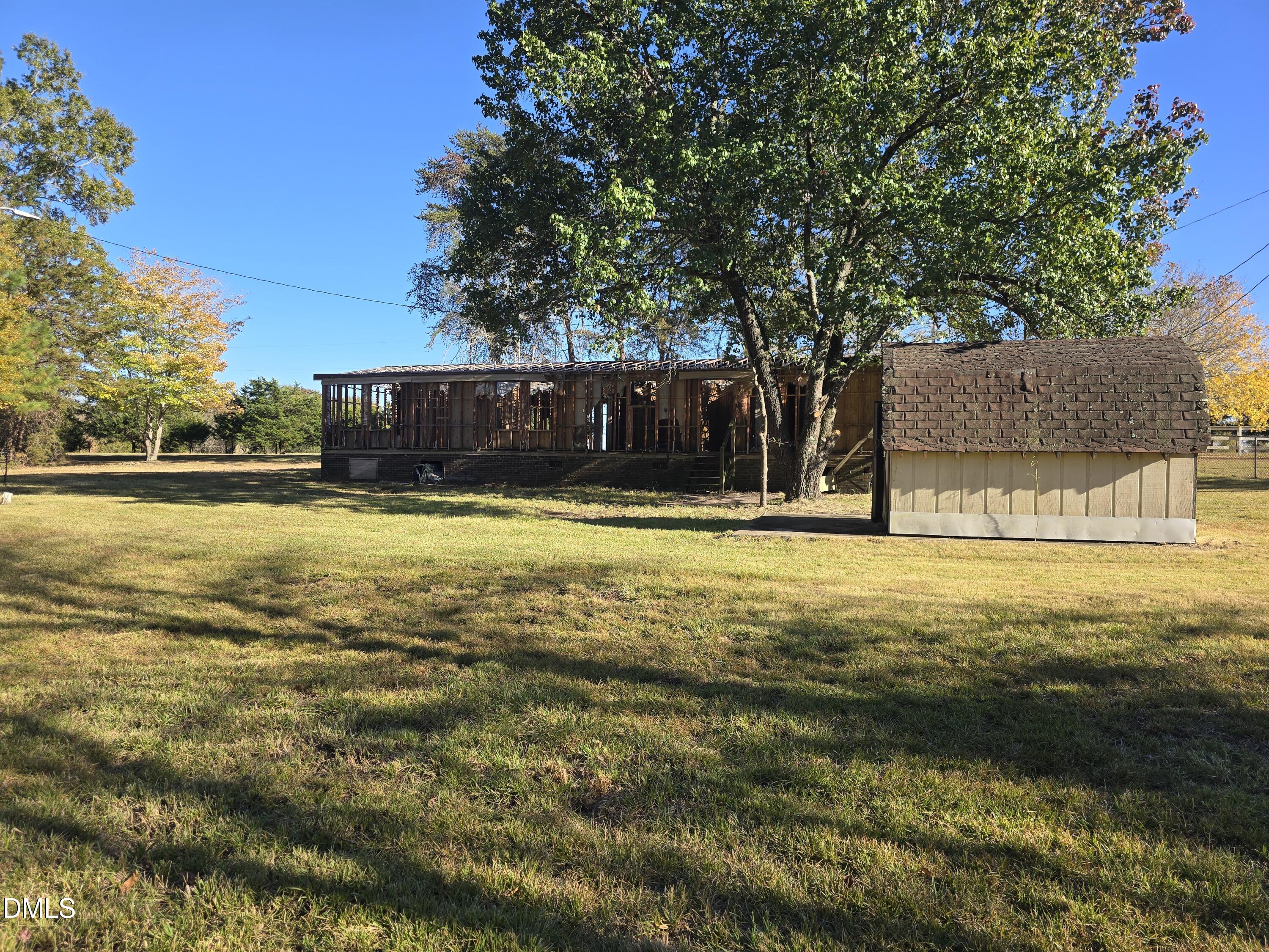 1862 Miles Chapel Road Mebane, NC 27302 - Photo 7 of 20 a swimming pool with outdoor seating and yard