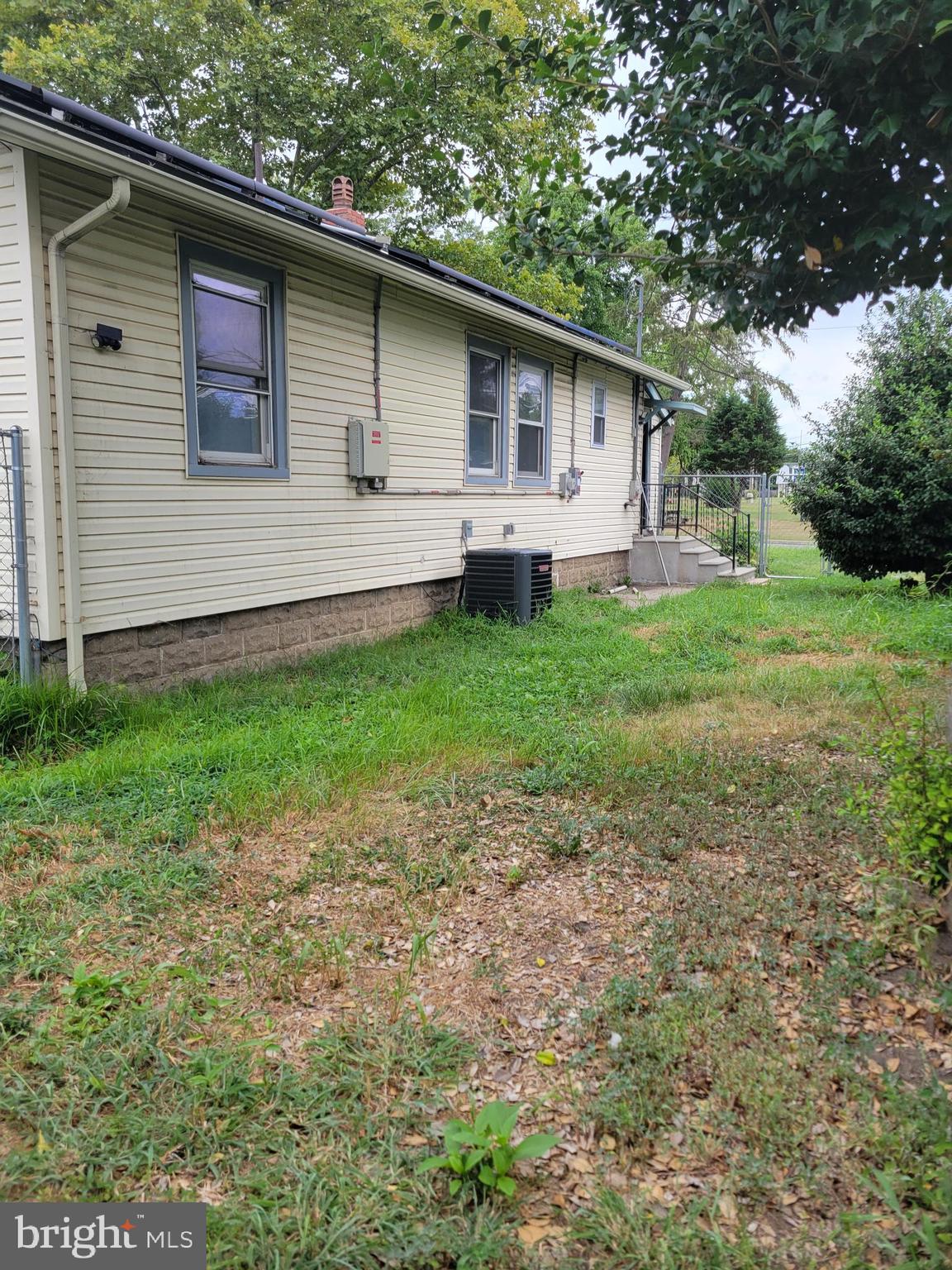 237 C Street Carneys Point, NJ 08069 - Photo 12 of 14 Fenced-in yard. With a brand new central air unit.
