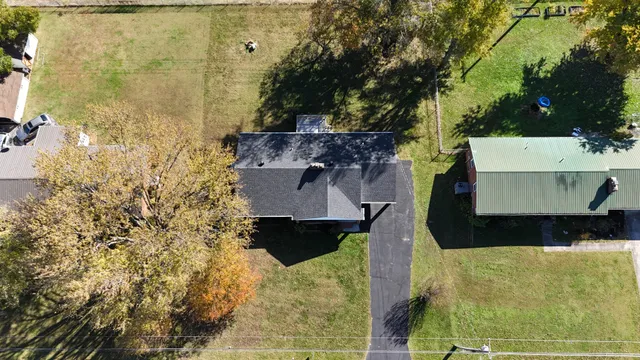 a kitchen with a stove and a refrigerator